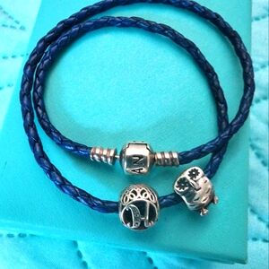 Pandora leather blue bracelet whit 2 sterling silver charms